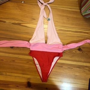 One piece bathing suit with low neckline